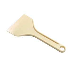 Spatula for levelling the stone mixture